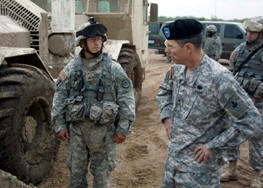 Two Soldiers and a vehicle