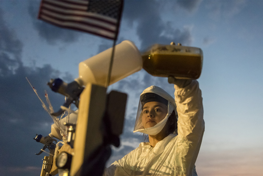 Technician prepares dissemination devices for biological simulant testing